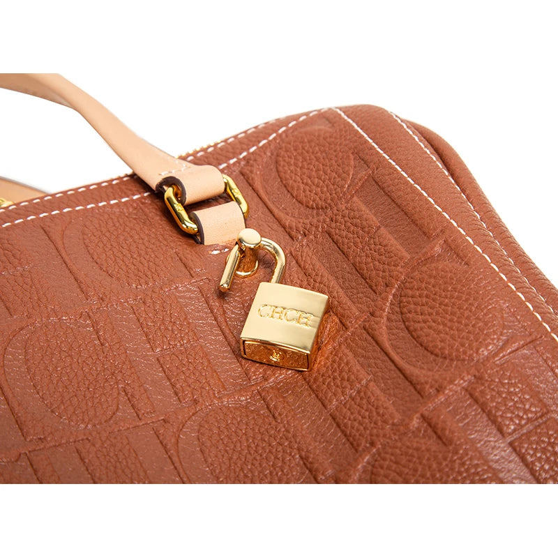 Vintage-Inspired Women's Solid Cowhide Tote Bags Embossed Geometric Patterns Gold-Toned Hardware